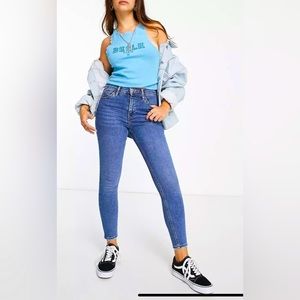 Topshop Petit Jamie Jeans with Jagged Hem Detailing in Mid Blue